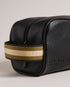 KAIIRO-Gifts-Your Toiletries Can Travel In Style Too. With Its Sleek Design And Smooth Leather Kaiiro Is A First-class Ticket For Your Personal Items. The Zip Fastening Keeps Everything Secure While The Spacious Interior Offers Plenty Of Room For Your Essentials. Washbag Faux leather Branded webbing handle Zip fastening Debossed logo Dimensions: 13cm x 25cm x 11cm- Ted Baker Romania